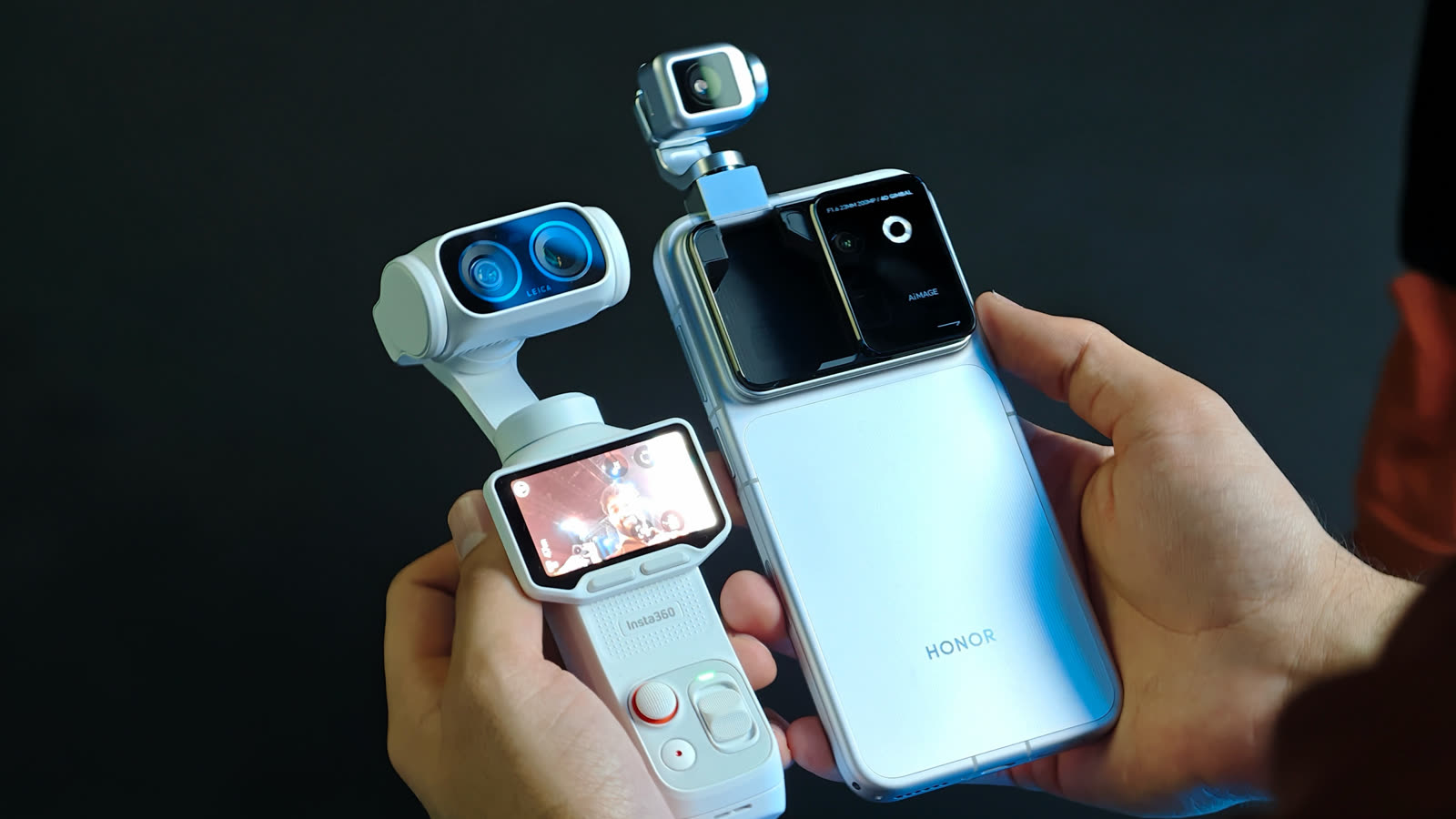 Insta360 Luna Ultra and HONOR Robot Phone held together with both gimbal cameras raised