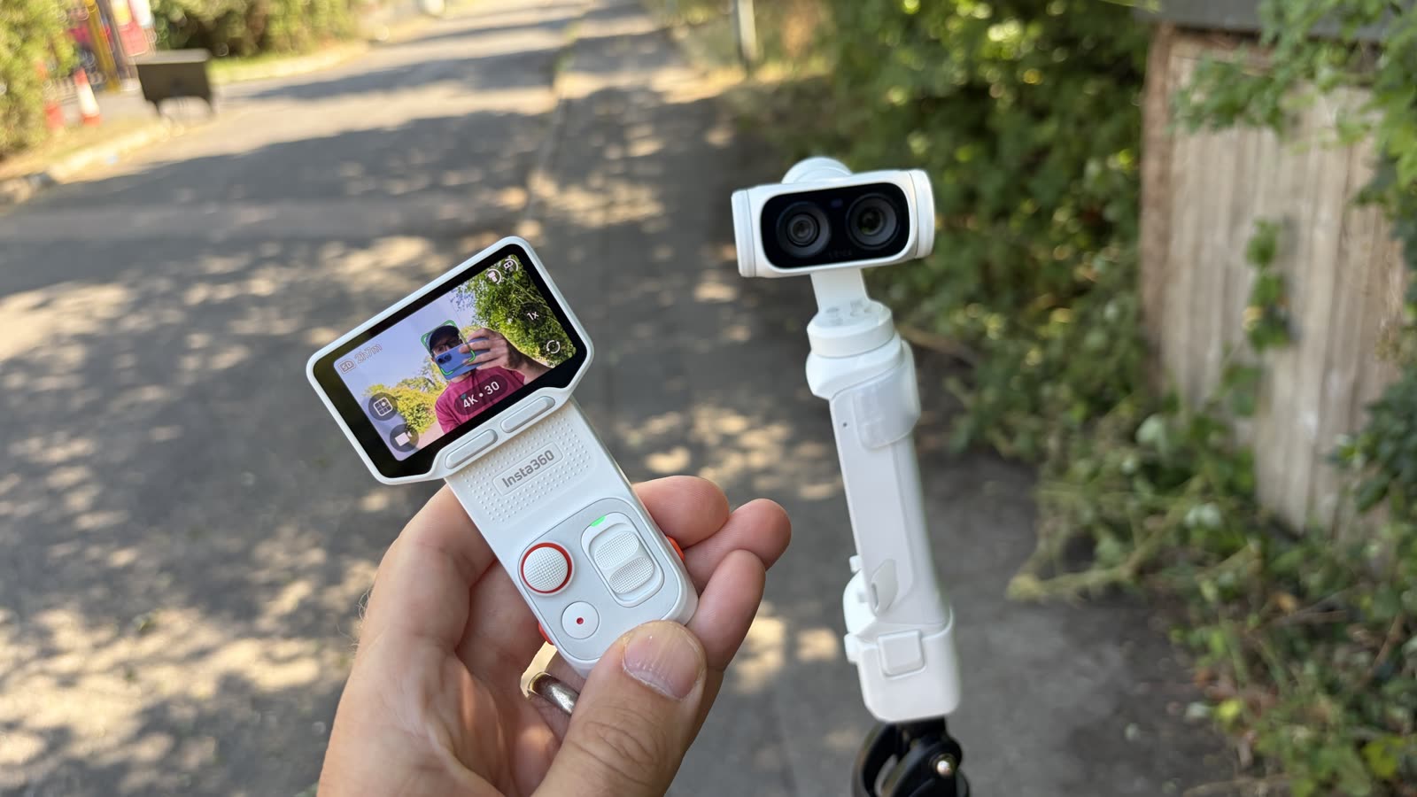 Insta360 Luna Ultra screen showing a person framed with subject tracking outdoors
